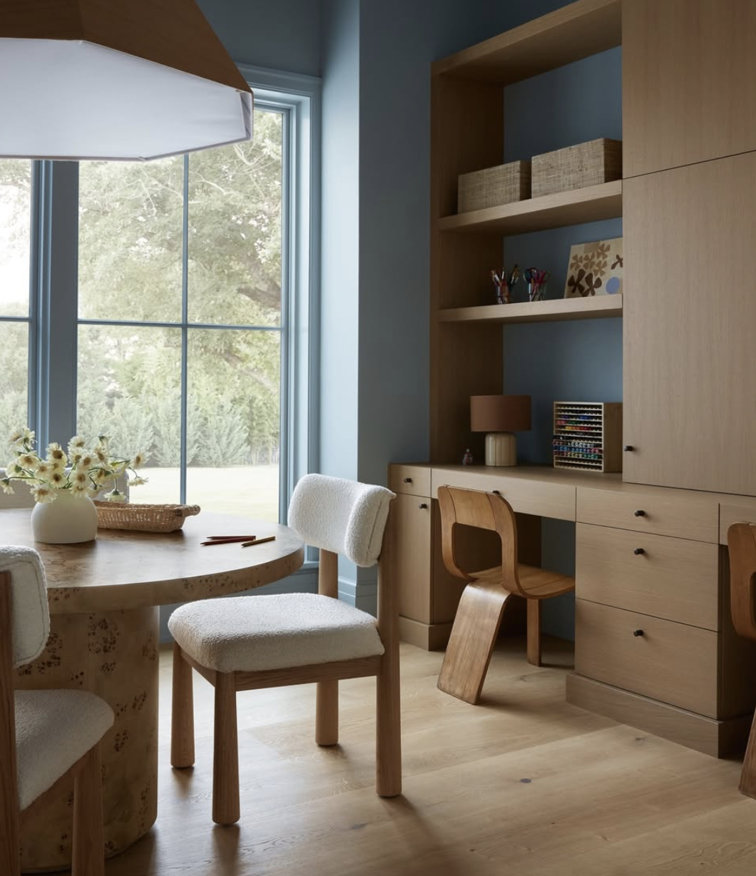 Calm bedroom with natural light, plants, and non-toxic materials